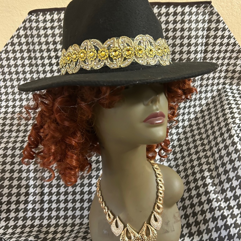 Chic Black Hat with Gold Detailing